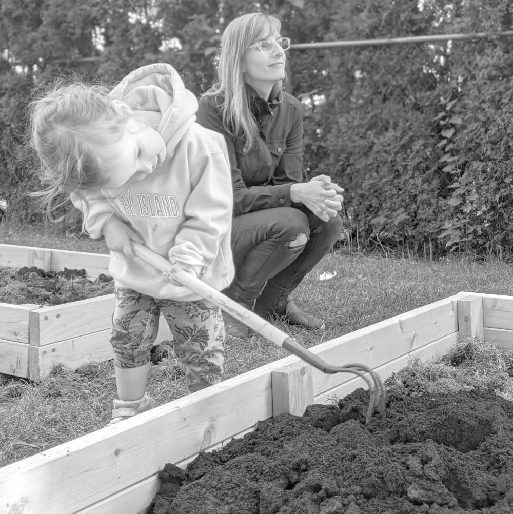 child working in garden.